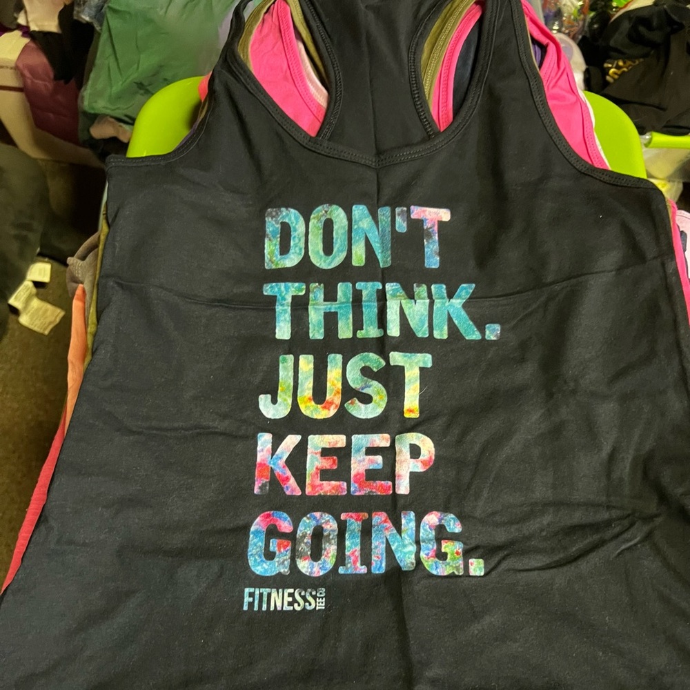 These Active Tanks have never been worn